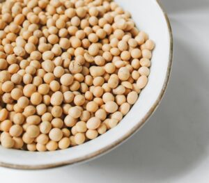 Soybean, soy, beans, crops, white plate, white table, feedstock, soybean oil